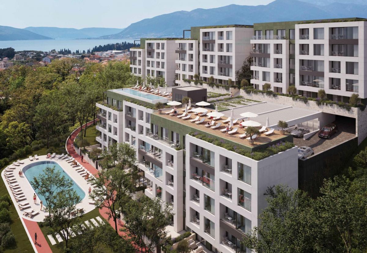 Jednosoban stan u modernom stambenom kompleksu u izgradnji sa bazenima i parkingom, Tivat